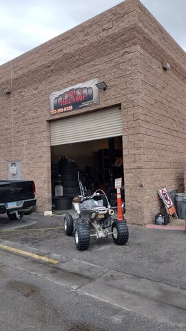 ATV Parked Outside Tire Shop 007 — VDK Tire Shop
