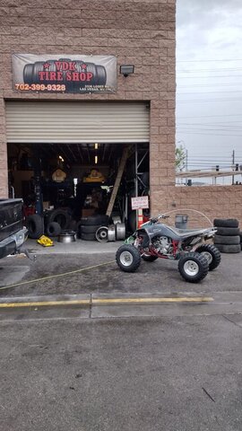 ATV Parked Outside Tire Shop 008 — VDK Tire Shop