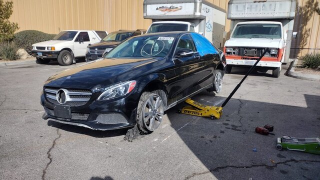 Black Mercedes Coupe On Jack 016 — VDK Tire Shop