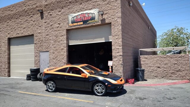 Black Orange Mitsubishi Eclipse Tire Shop 020 — VDK Tire Shop