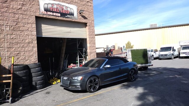 Grey Audi Convertible Outside Tire Shop 013 — VDK Tire Shop