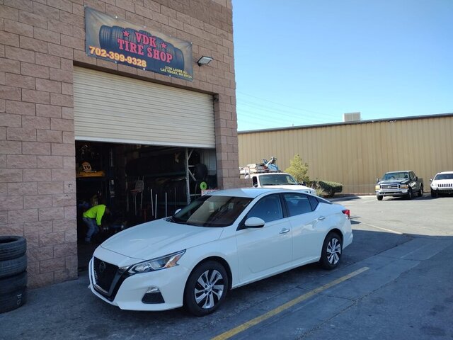 White Nissan Altima Tire Shop 044 — VDK Tire Shop