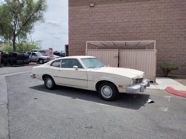 White Vintage Car Parking Lot 028 — VDK Tire Shop