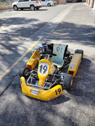 Yellow Go Kart Number 19 013 — VDK Tire Shop
