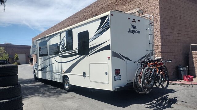 White Jayco RV With Bikes 004 — VDK Tire Shop