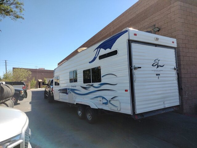 White Toy Hauler RV Parked 015 — VDK Tire Shop