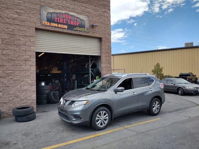 Nissan Rogue Parked At Tire Shop 016 — VDK Tire Shop