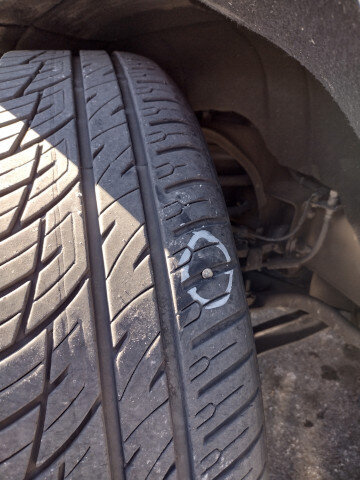 Car Tire With Screw Puncture 004 — VDK Tire Shop