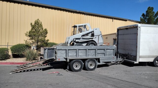 Skid Steer On Dump Trailer 008 — VDK Tire Shop