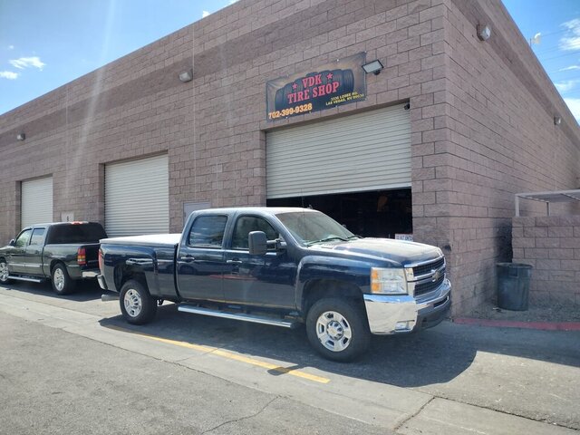 Blue Pickup Truck Outside Tire Shop 055 — VDK Tire Shop