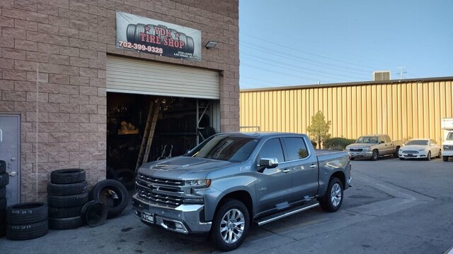 Silver Pickup Truck Outside Tire Shop 029 — VDK Tire Shop