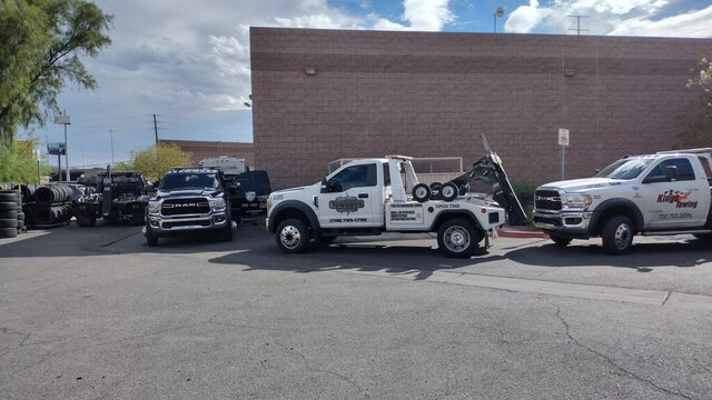 Tow Trucks Parked In Lot 011 — VDK Tire Shop