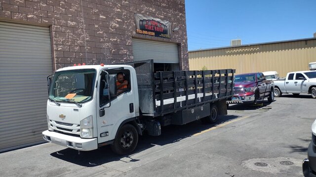 White Chevy Stake Bed Truck 019 — VDK Tire Shop