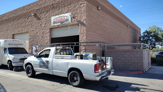 White Pickup Truck Outside Tire Shop 034 — VDK Tire Shop