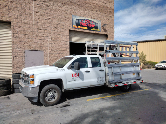 White Utility Truck Parked Outside 008 — VDK Tire Shop