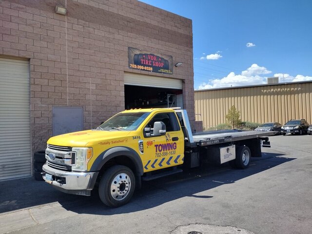 Yellow Flatbed Tow Truck 054 — VDK Tire Shop
