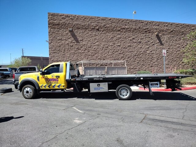 Yellow Flatbed Tow Truck 069 — VDK Tire Shop
