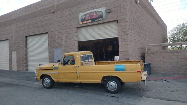 Yellow Vintage Truck Outside Tire Shop 039 — VDK Tire Shop