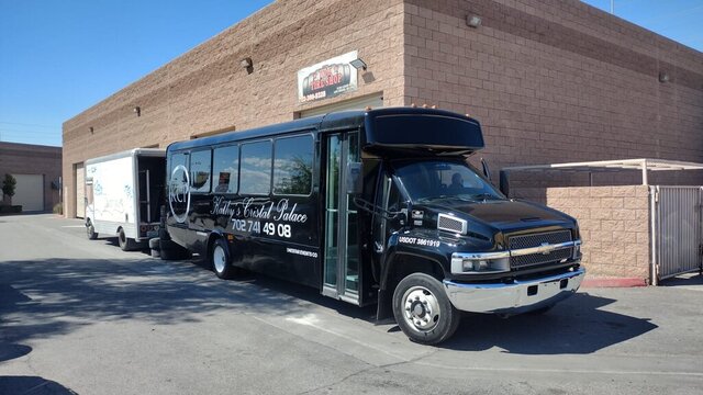 Black Party Bus Parked 002 — VDK Tire Shop
