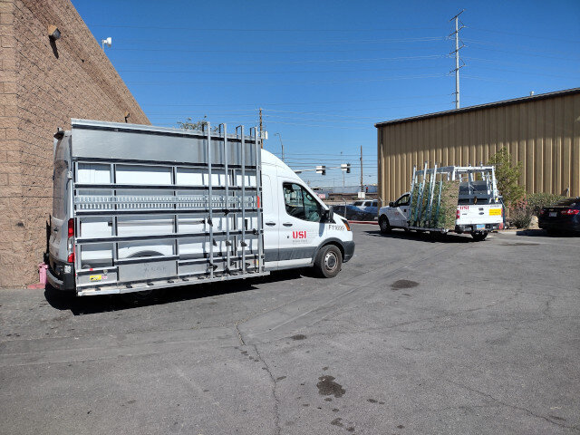 White Commercial Van With Glass Rack 031 — VDK Tire Shop