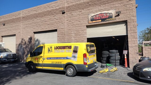 Yellow Locksmith Van Outside Tire Shop 008 — VDK Tire Shop